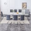 1 table and 8 chairs set.Modern Grey MDF Faux Marble Dining Table with Double V-Shaped Supports.Paired with 8 modern PU artificial leather soft cushio